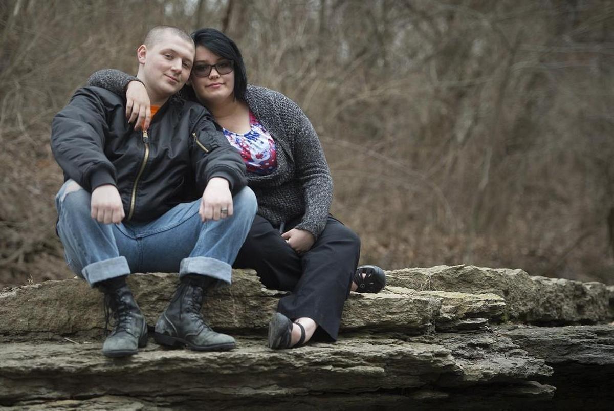 Dylan, 17, and Sammy Knowles, 15, share a favorite spot at a park in Lansing, Kan.