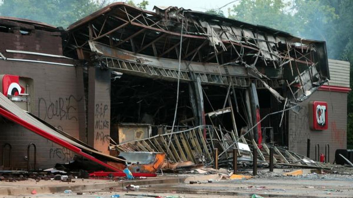 
Scenes from the clean up on Monday, Aug. 11 2014, after a after violent night in Ferguson, Mo.
