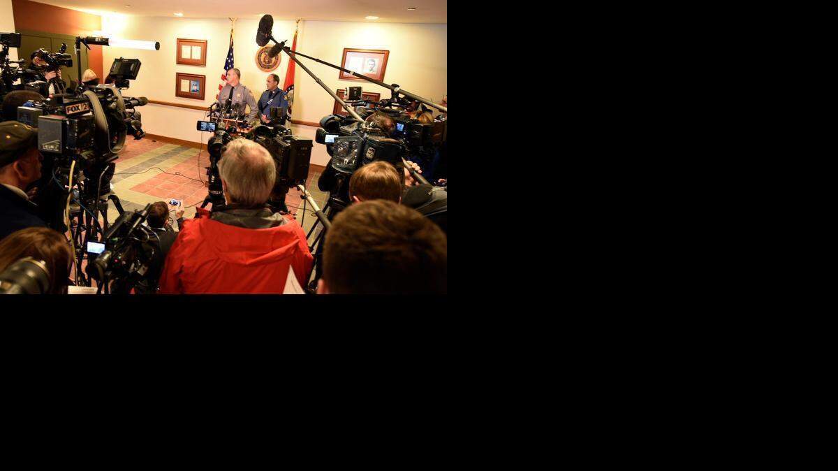 
Texas County Sheriff James Sigman answered questions for a swarm of media representatives Friday, Feb. 27, 2015, at Houston, Mo. in regard to the slaying of seven people around the Texas County town of Tyrone, Mo.
