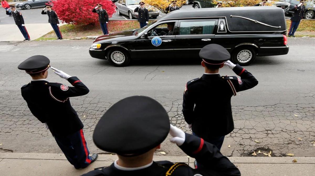 Cadets at Wentworth Military Academy salute a hearse in 2013 carrying the late former Missouri congressman Ike Skelton, one of the more prominent alumni of the school that will be closing this spring.