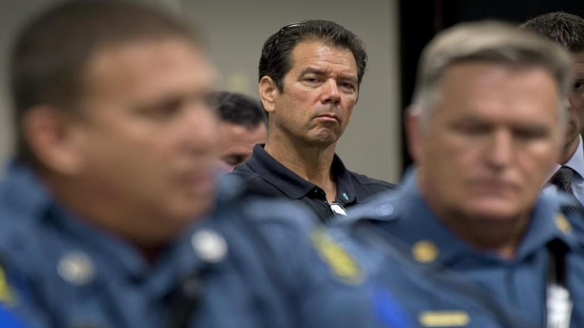 A Missouri House special committee heard testimony in October 2014 concerning the merger of the Water Patrol and the Highway Patrol. Craig Ellingson (center) whose son, Brandon Ellingson, drowned at the Lake of the Ozarks, listened intently as Missouri Highway Patrol Sgt. Randy Henry (left) and patrol superintendent Ronald Replogle testified in Jefferson City.