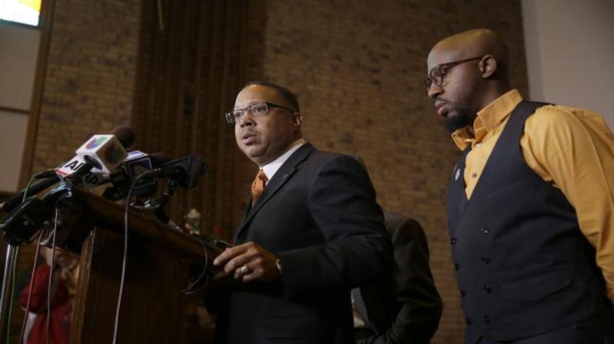 
Anthony Gray, attorney for the family of Michael Brown, spoke as the Rev. Carlton Lee, president of the National Action Network Ferguson chapter, looked on at a news conference Friday in St. Louis County. Gray and Lee spoke about preparations for a decision from a grand jury whether to indict Ferguson police officer Darren Wilson in the shooting of Michael Brown. 
