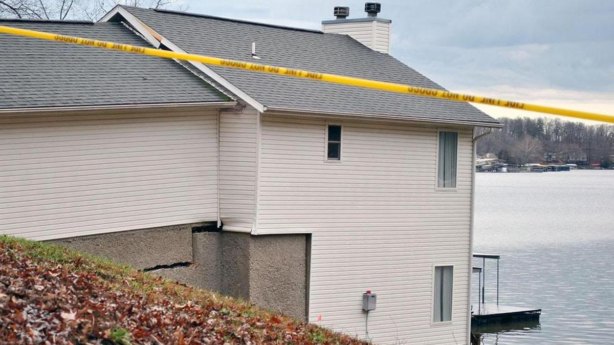 The ground above the home has shifted and the foundation, roof, seawall and other parts of the home have cracked as this home at Cub Cove Point north of Camdenton has inexplicably slid three feet toward the water.