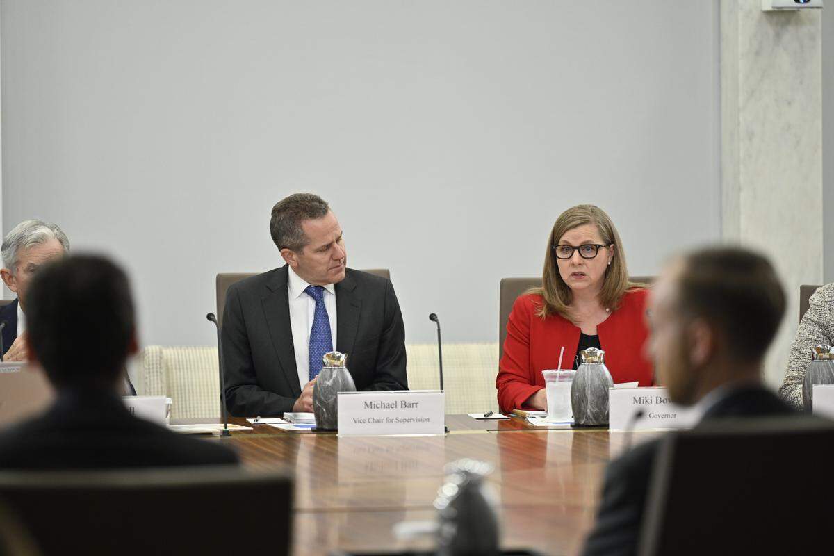 Michelle Bowman, left, during a 2023 Federal Reserve Board of Governors meeting.