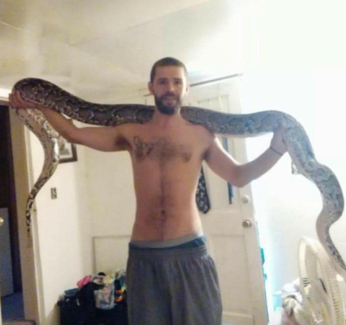 Ben Trexel III and his Burmese python, SS Wraps.