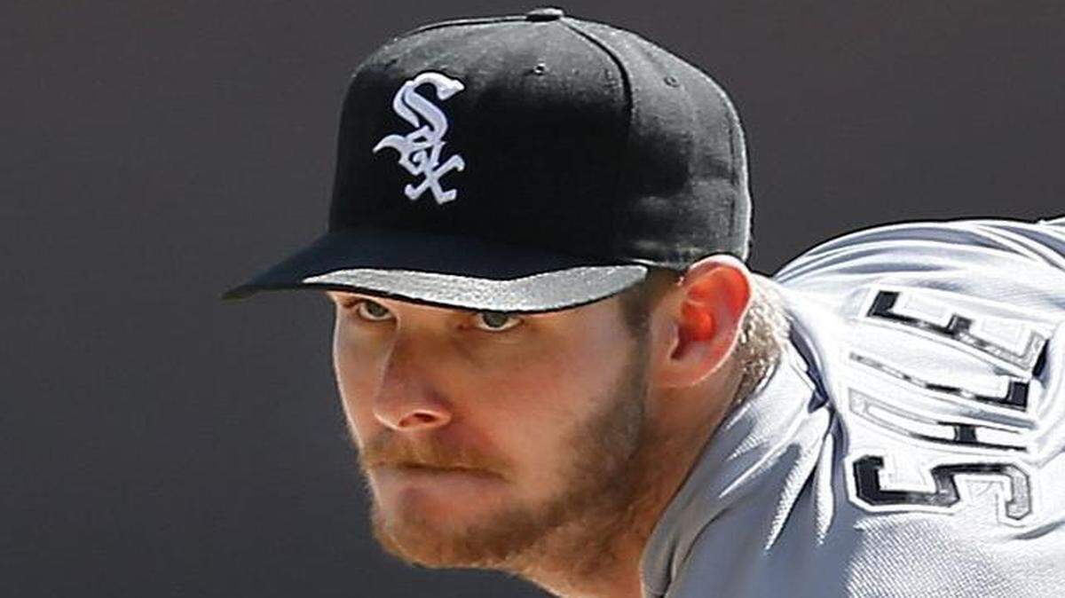 
White Sox executive vice president Kenny Williams says Chris Sale would be held out of the opener with a broken right foot, clearing the way for Jeff Samardzija to start in his place. 
