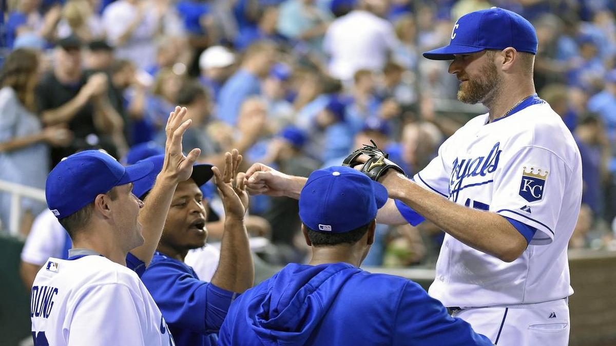 
Kansas City Royals relief pitcher Wade Davis was greeted by teammates after getting out of the eighth inning during a game in June.
