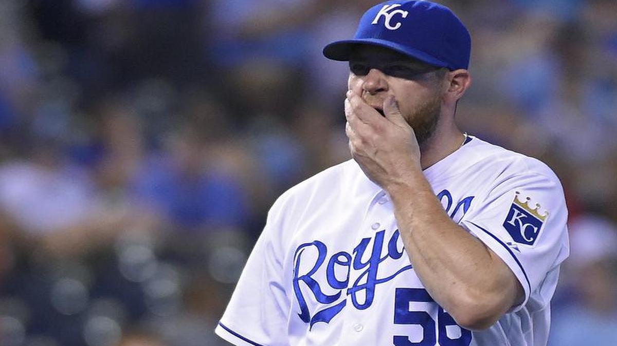 
Kansas City Royals relief pitcher Greg Holland walked off the field after being relieved in the ninth inning of Thursday’s game.
