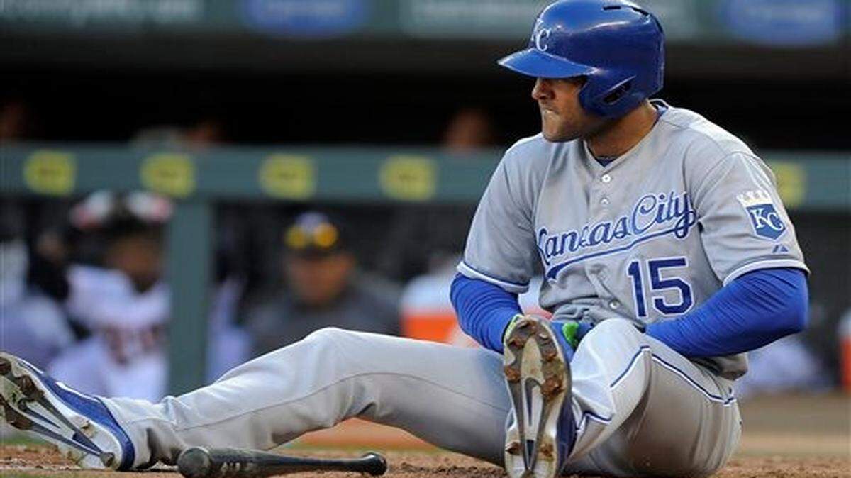 
Royals right fielder Alex Rios looks out at Twins pitcher J.R. Graham after being hit on the wrist during the eighth inning of Monday’s baseball game in Minneapolis. The Royals won 12-3.
