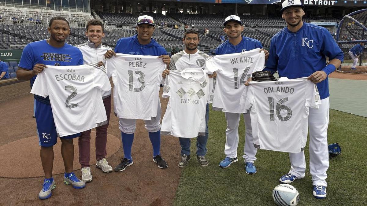 
Sporting KC players Paulo Nagamura and Bernardo Añor delivered some of their new jerseys to Kansas City Royals players Alcides Escobar, Salvador Perez, Omar Infante and Paulo Orlando before Friday game against the Detroit Tigers at Kauffman Stadium.
