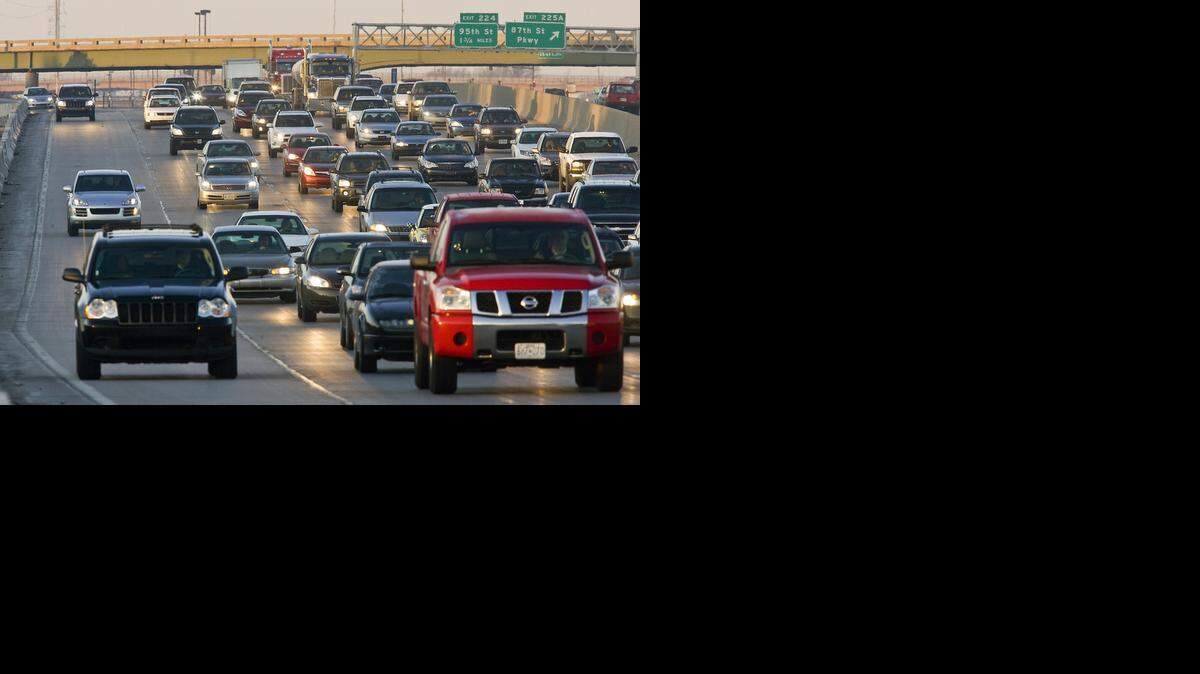 
Morning commuters (left) merge into the crush of traffic on Interstate 35. 
