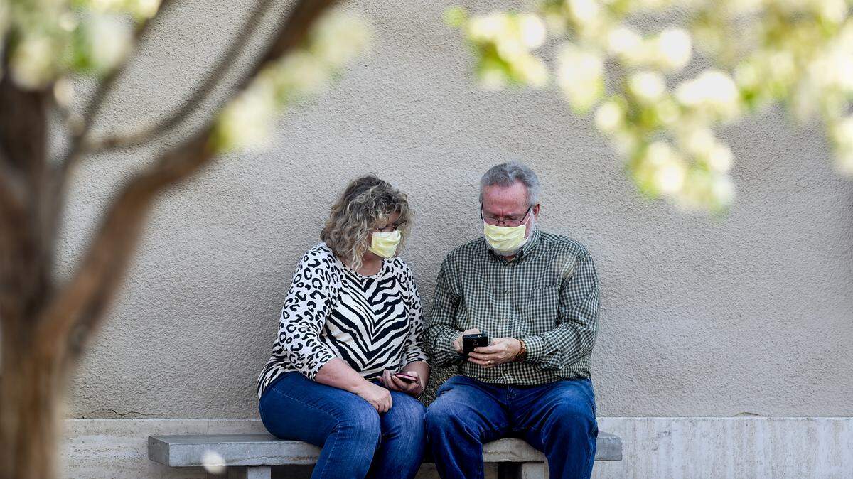 Face masks are a political football in Johnson County and around the nation.