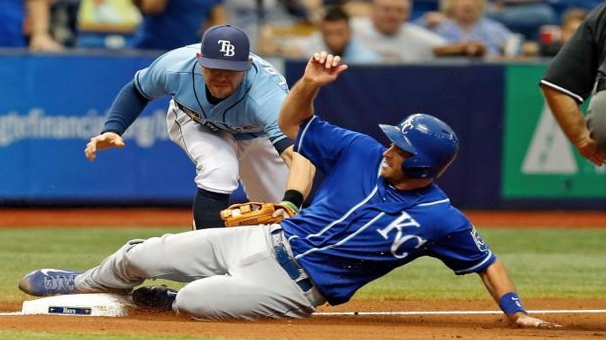 
The Royals' Drew Butera, who started Sunday at catcher, slid in safely to third ahead of a tag from the Rays' Evan Longoria during a game last month in St. Petersburg, Fla.
