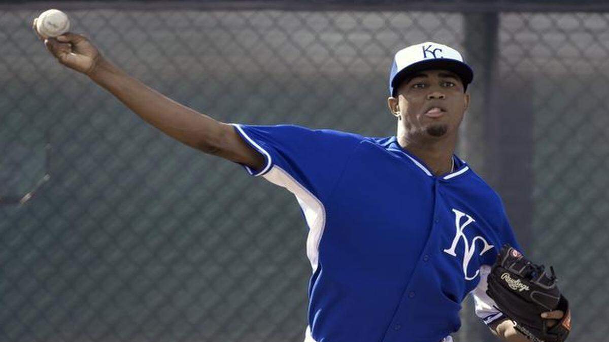 
Kansas City Royals pitcher Jandel Gustave threw during Saturday’s spring training workout in Surprise, Ariz.
