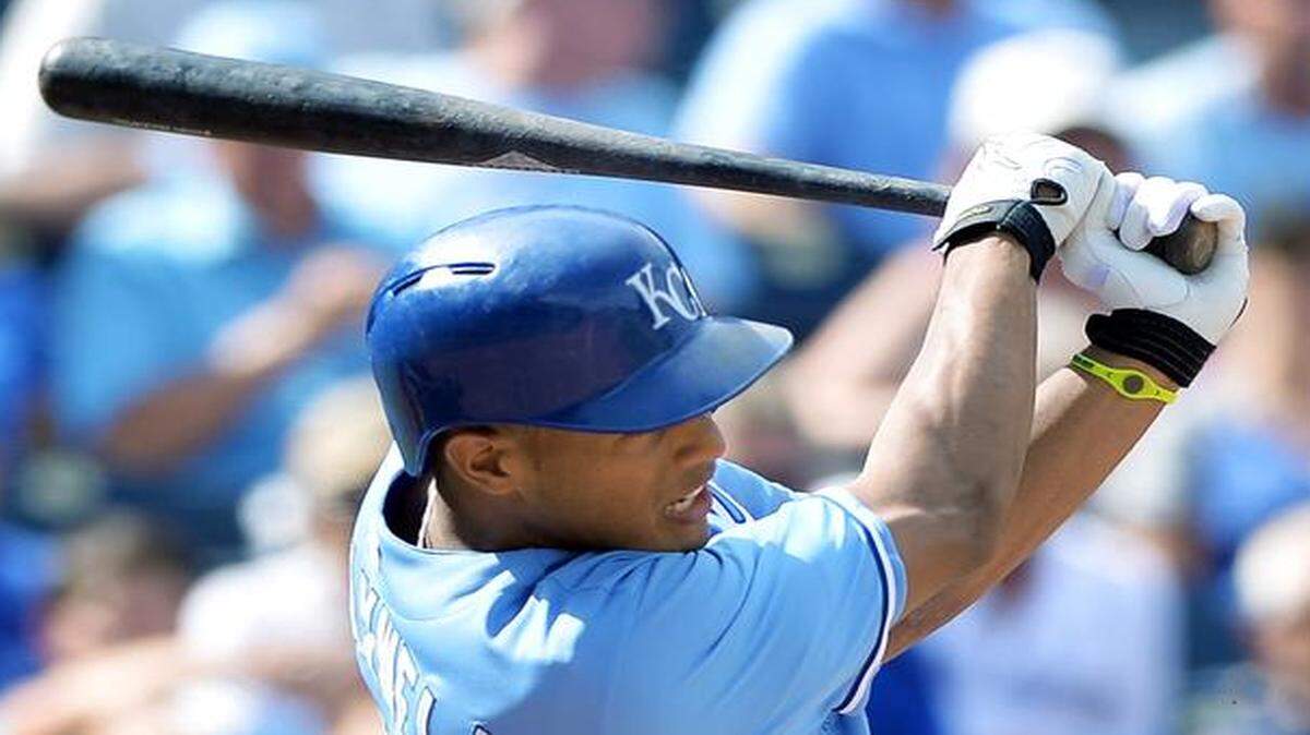 
The Royals Justin Maxwell follows through on a sacrifice fly to score Billy Butler from third during their Sept. 5 game against the Mariners at Kauffman Stadium.
