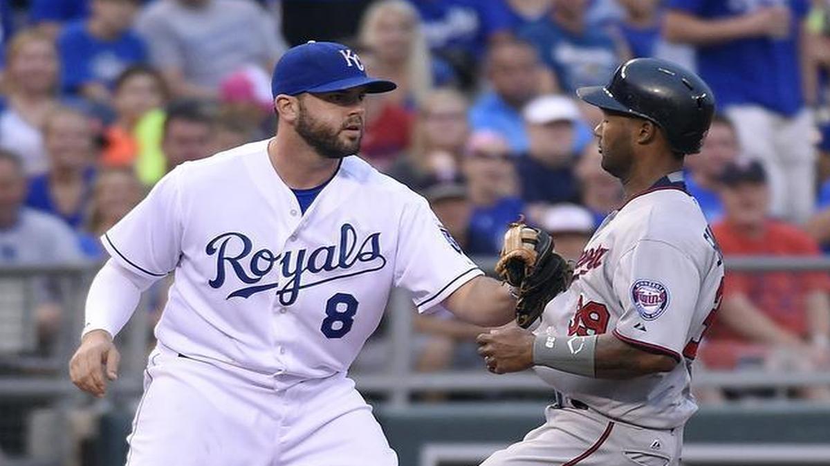 
Kansas City Royals third baseman Mike Moustakas (8) taged out the Minnesota Twins' Danny Santana (39) on a rundown between second and third in the third inning Thursday at Kauffman Stadium.
