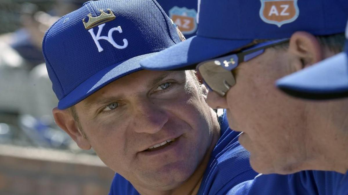 NASCAR driver Clint Bowyer visited with Kansas City Royals manager Ned Yost during spring training last year.