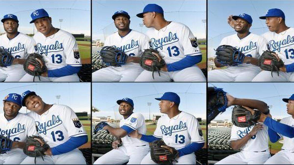 
Kansas City Royals players Lorenzo Cain and Salvador Perez traveled together through the line of photographers having their own type of fun on photo day Friday at spring training in Surprise, Ariz.
