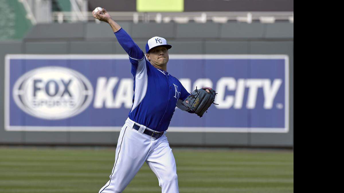 Royals pitcher Kris Medlen (39) warms up before Monday's baseball game against the Pirates at Kauffman Stadium.