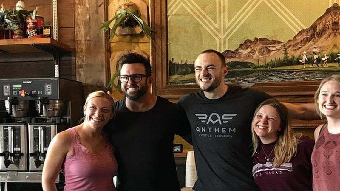 Kansas City Royals reliever Peter Moylan, second from left, poses with employees at Thou Mayest Coffee Roasters in the Crossroads on Friday, July 21, 2017.