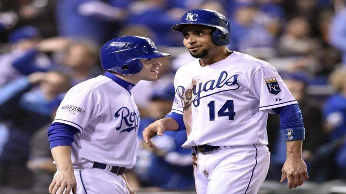 
Royals second baseman Omar Infante smiled after he scored on a double hit by shortstop Alcides Escobar to give the Royals a 9-0 lead in the fifth inning of game six of the World Series on Oct. 28 at Kauffman Stadium.
