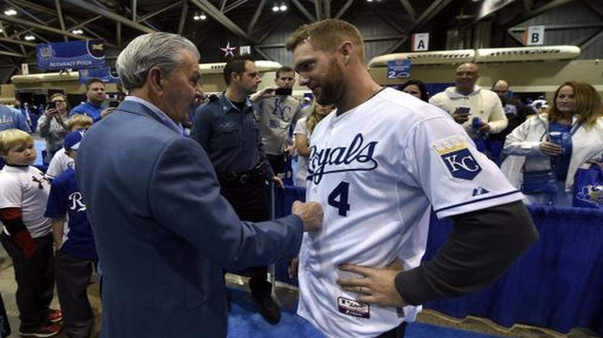 
David Glass (left) gave a playful punch to Alex Gordon during Royals FanFest last month at Bartle Hall in Kansas City.
