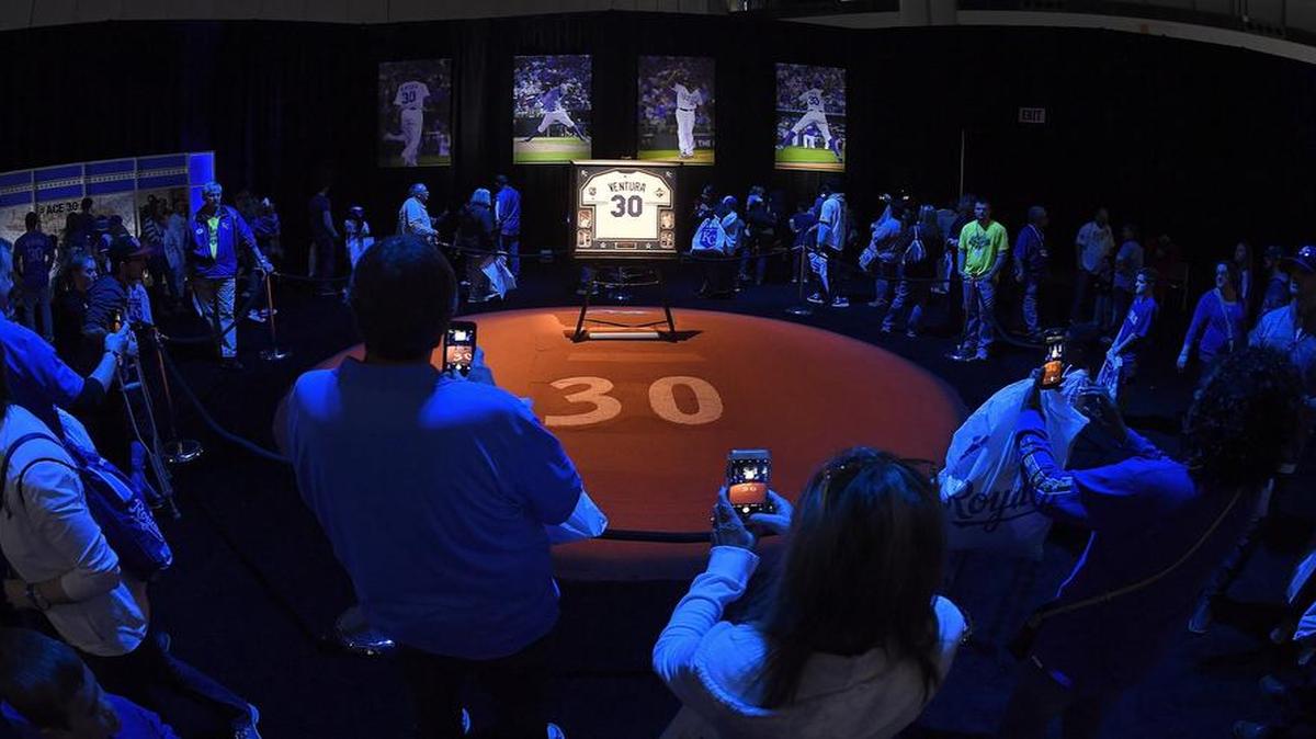 Fans walked through a memorial exhibit for Kansas City Royals pitcher Yordano Ventura during the team’s FanFest on Saturday at Bartle Hall.