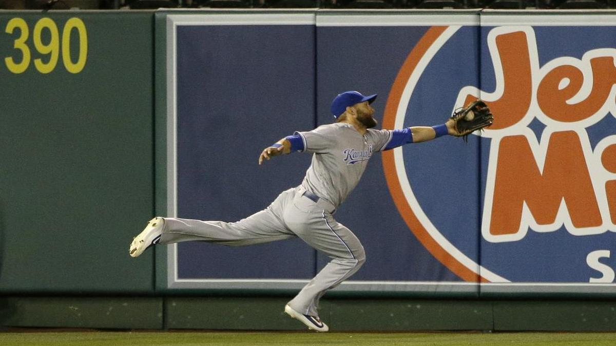 Royals left fielder Alex Gordon stretched out to take away a hit from Albert Pujols on Tuesday night.