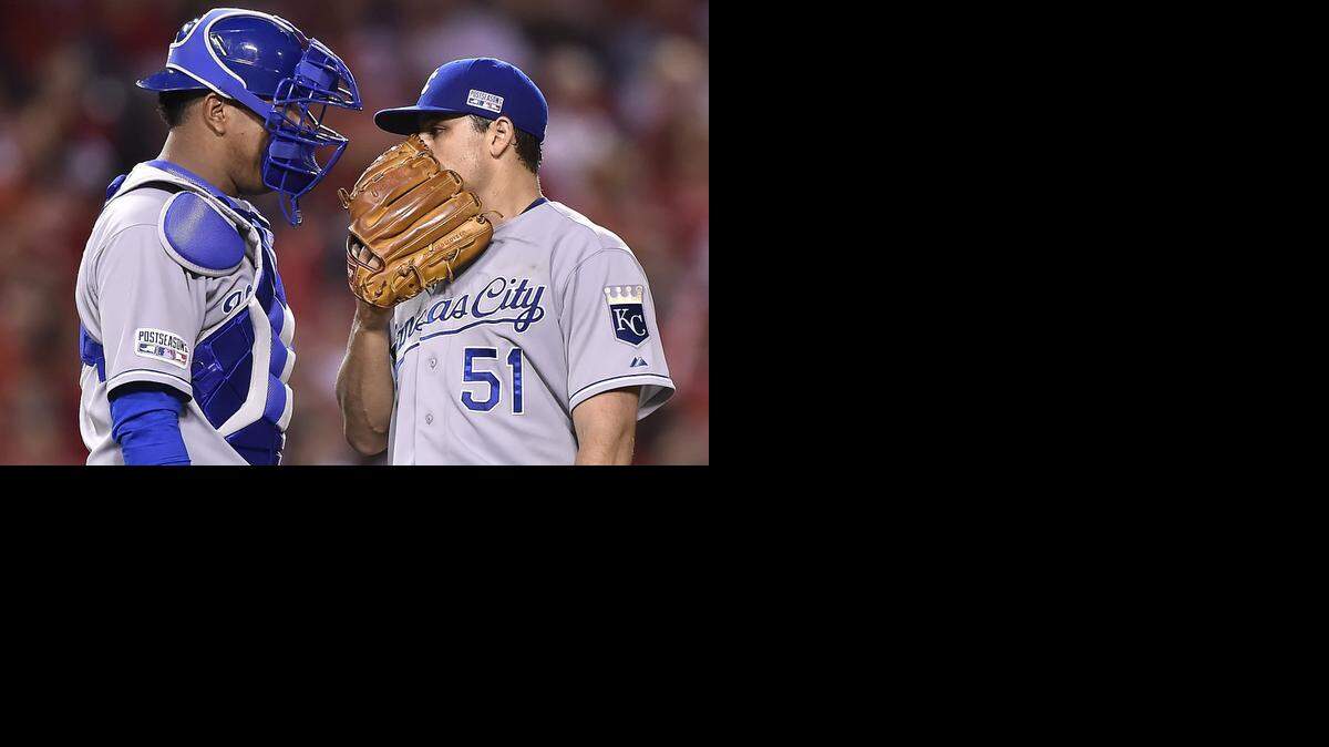 
Kansas City Royals catcher Salvador Perez and pitcher Jason Vargas spoke in the sixth inning against the Los Angeles Angels during the ALDS baseball game Oct. 2, 2014 at Angels Stadium in Anaheim, Calif.
