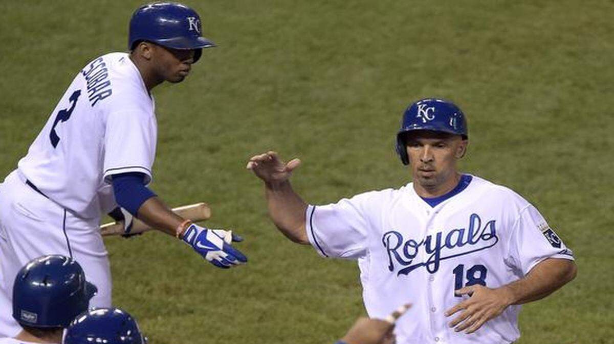 
The Kansas City Royals’ Raul Ibañez (18) was greeted after scoring on a double by Mike Moustakas in the fifth inning on July 31 against the Minnesota Twins at Kauffman Stadium in Kansas City. The Royals have interest in bringing Ibañez back in an off-field role next year.
