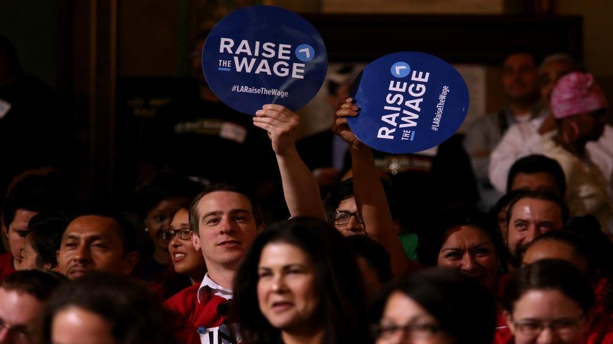 
Members of Unite Here showed their support for raising the minimum wage before a Los Angeles City Council vote earlier this month.
