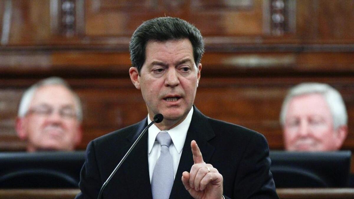 In his final State of the State address, Kansas Gov. Sam Brownback took a swipe at the Kansas City school district, which he referred to as “America’s most costly educational failure.”