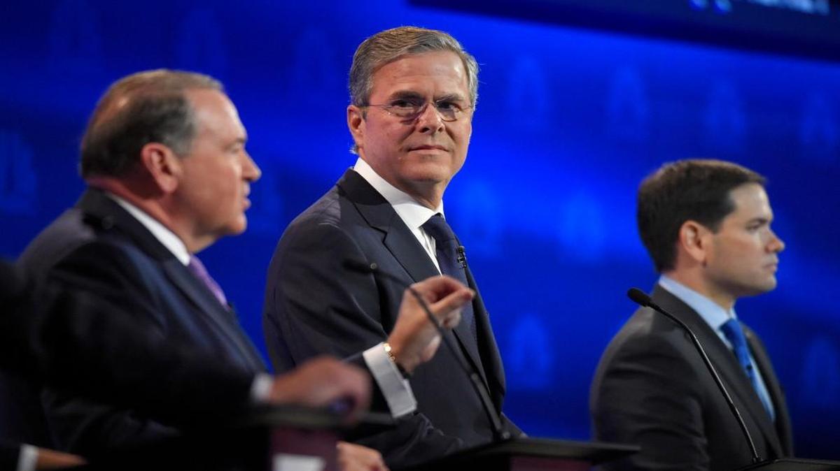 Mike Huckabee (from left), Jeb Bush and Marco Rubio were part of the CNBC Republican presidential debate Wednesday at the University of Colorado in Boulder.