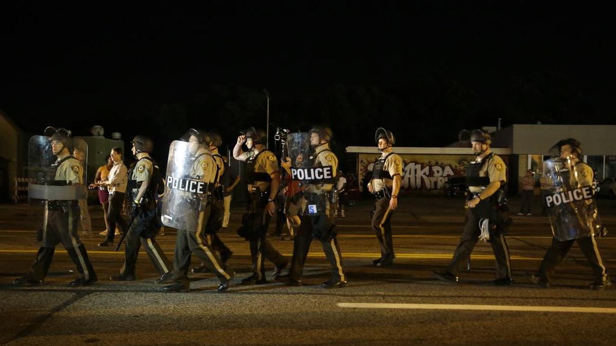 
Continuing protests in Ferguson, Mo., and elsewhere have law enforcement experts calling for change.
