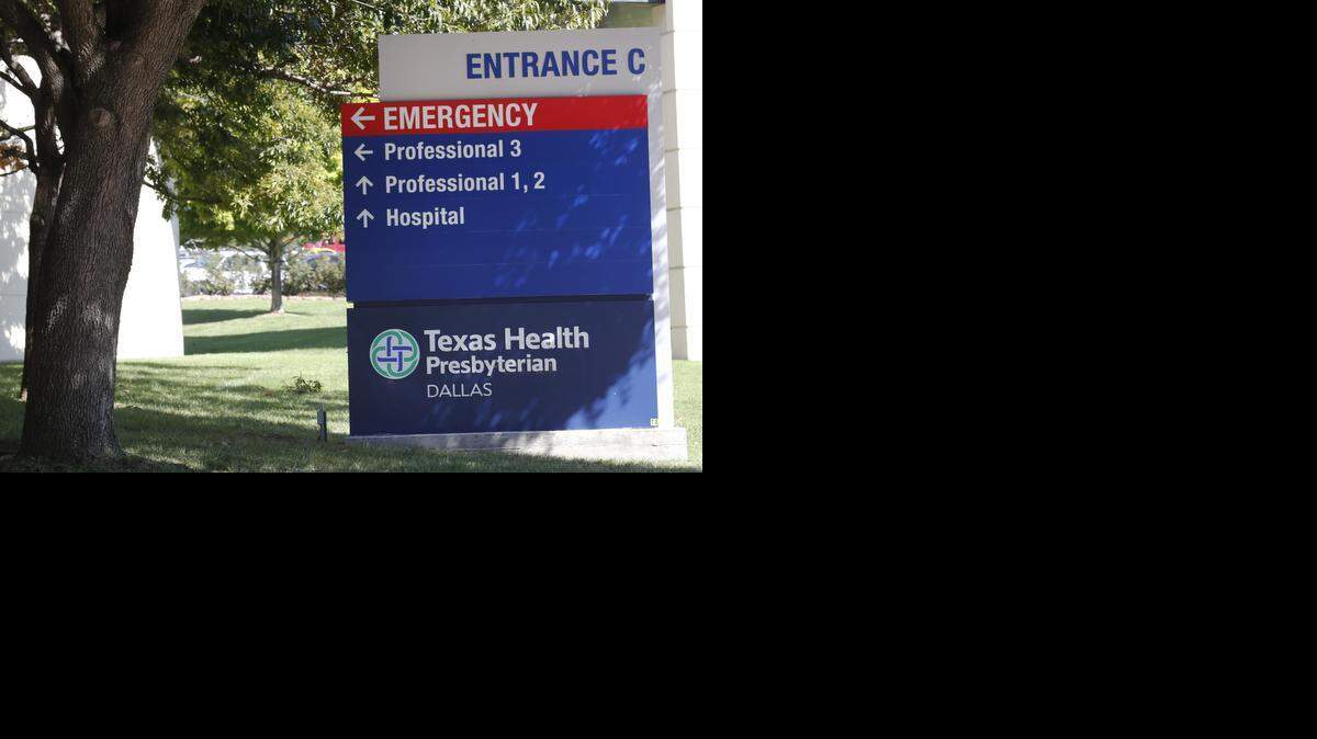 
A sign marks Entrance C at Texas Health Presbyterian Hospital in Dallas where Thomas Eric Duncan, the Ebola patient who traveled from Liberia to Dallas last week, is being treated.
