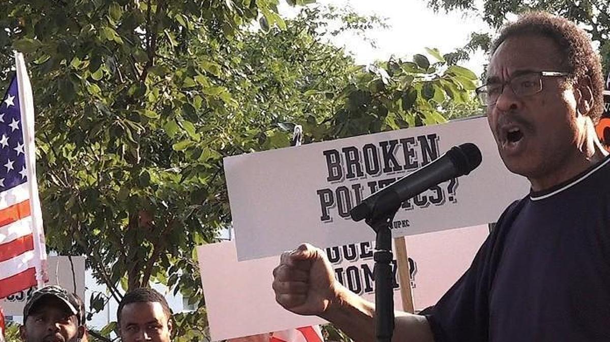 U.S. Rep. Emanuel Cleaver, shown here at a rally for a higher minimum wage, voted against an impeachment resolution aimed at President Donald Trump.