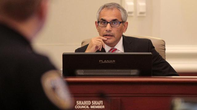 Southalke City Council member Shahid Shafi speaks with Police Chief James Brandon about changes to the city’s helmet law at the City of Southlake City Council meeting in this file photo from Nov. 3, 2015.