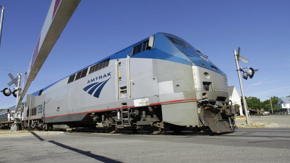 
An Amtrak commuter train moved through a crossing gate in Springfield, Ill., on its way to Chicago. 
