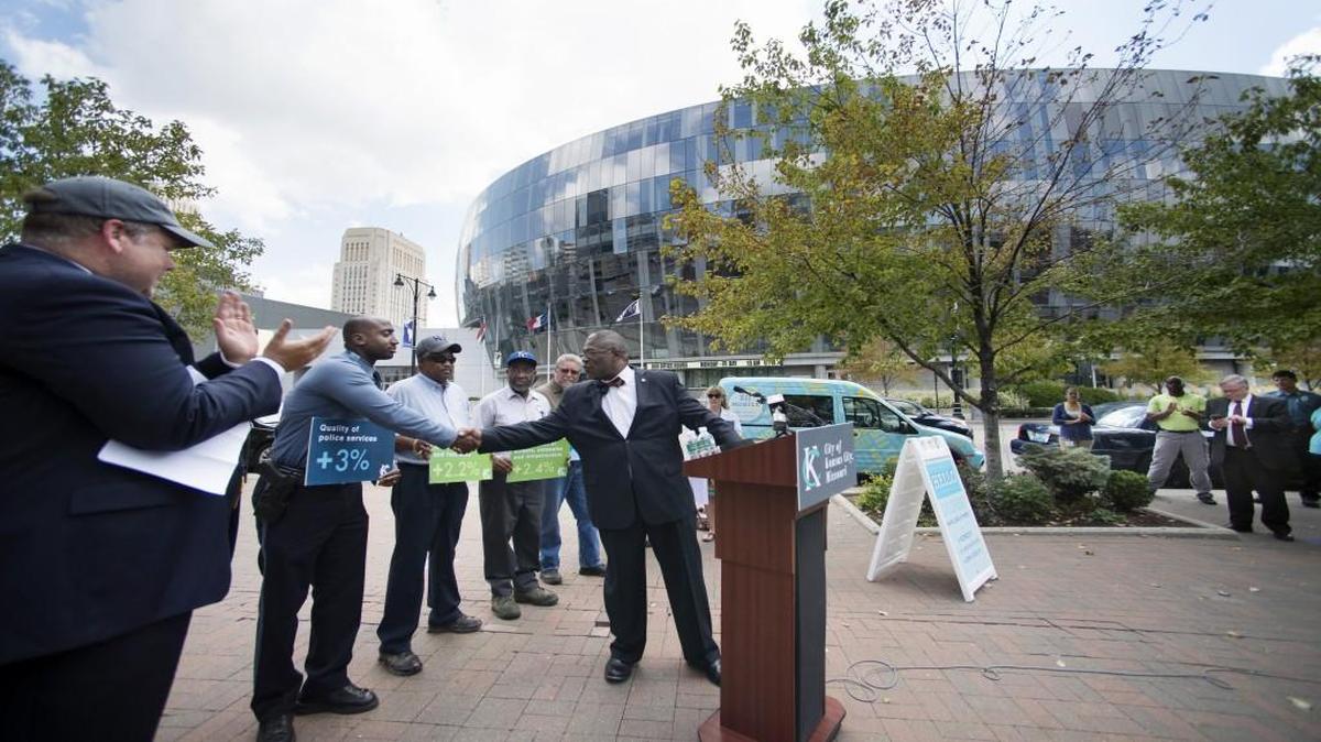 City Manager Troy Schulte (far left) took his usual place out of the spotlight earlier this year when Mayor Sly James and other officials announced improved scores from the city’s 2014-2015 Citizen Satisfaction Survey.