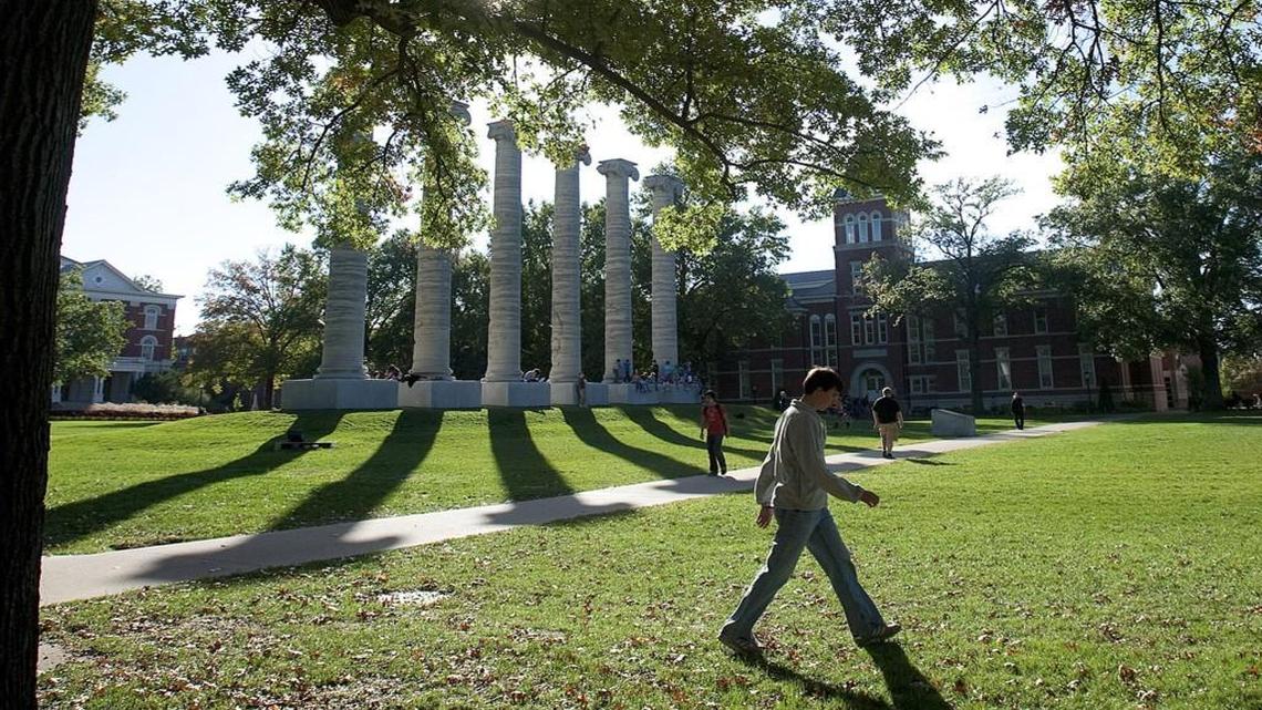 Students walk by the columns at the University of Missouri in Columbia.