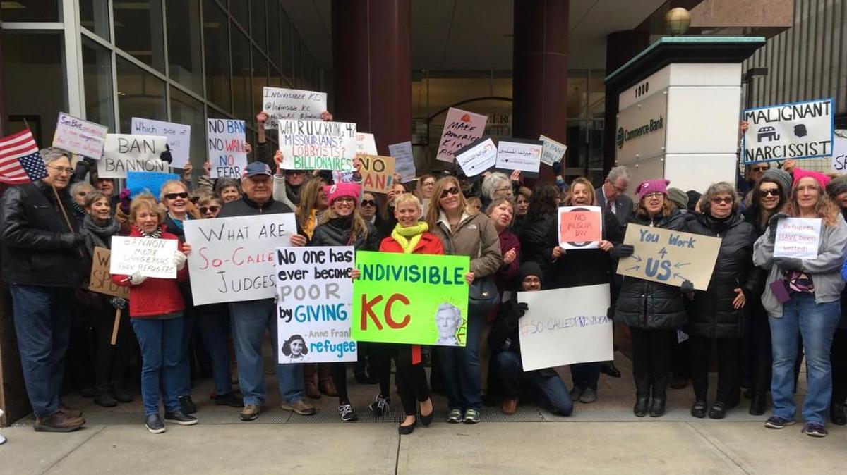 Constituents gather outside the downtown Kansas City, MO office of Sen. Roy Blunt.