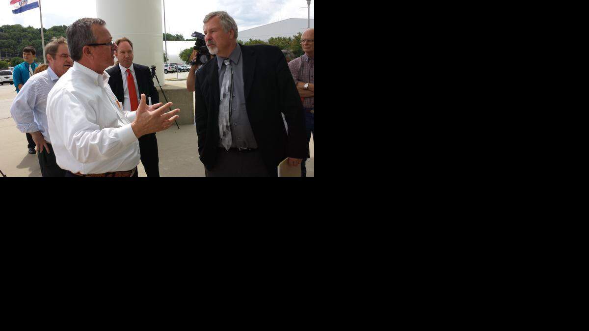 
Councilman Ed Ford (right) listened to American Royal CEO Bob Petersen on a Kemper Arena tour.
