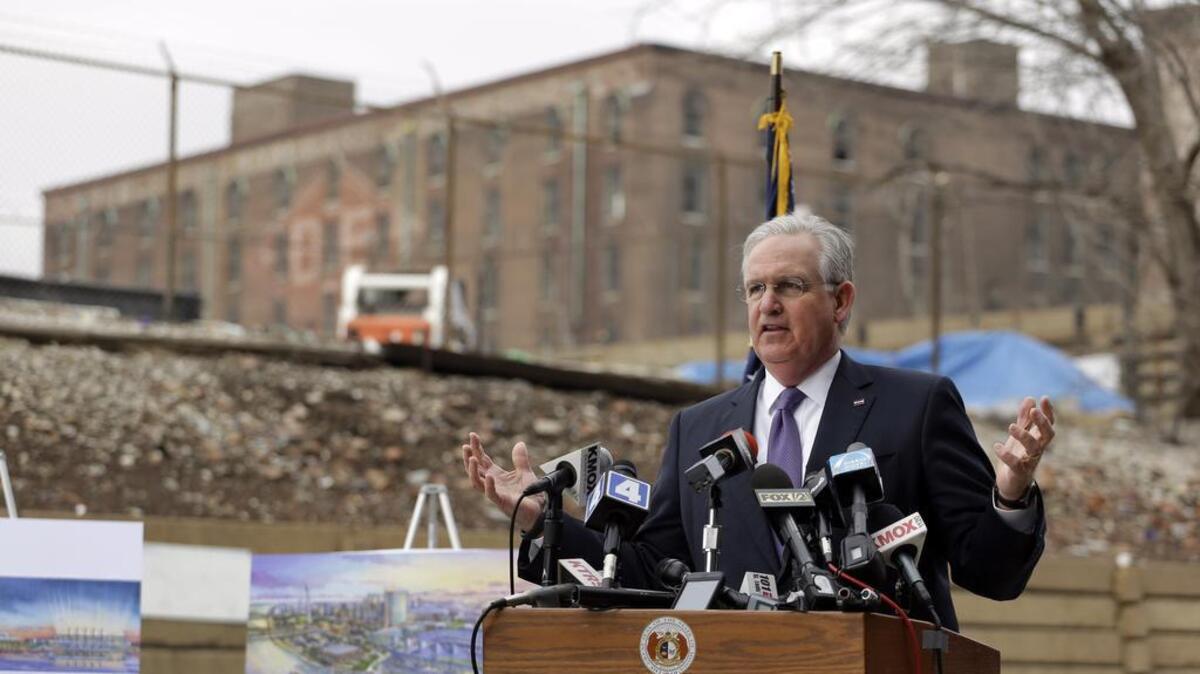 Missouri Gov. Jay Nixon speaks during a news conference in February 2010 on the site of a proposed NFL stadium in a blighted area north of downtown St. Louis. The proposal has created friction among Nixon and state lawmakers.