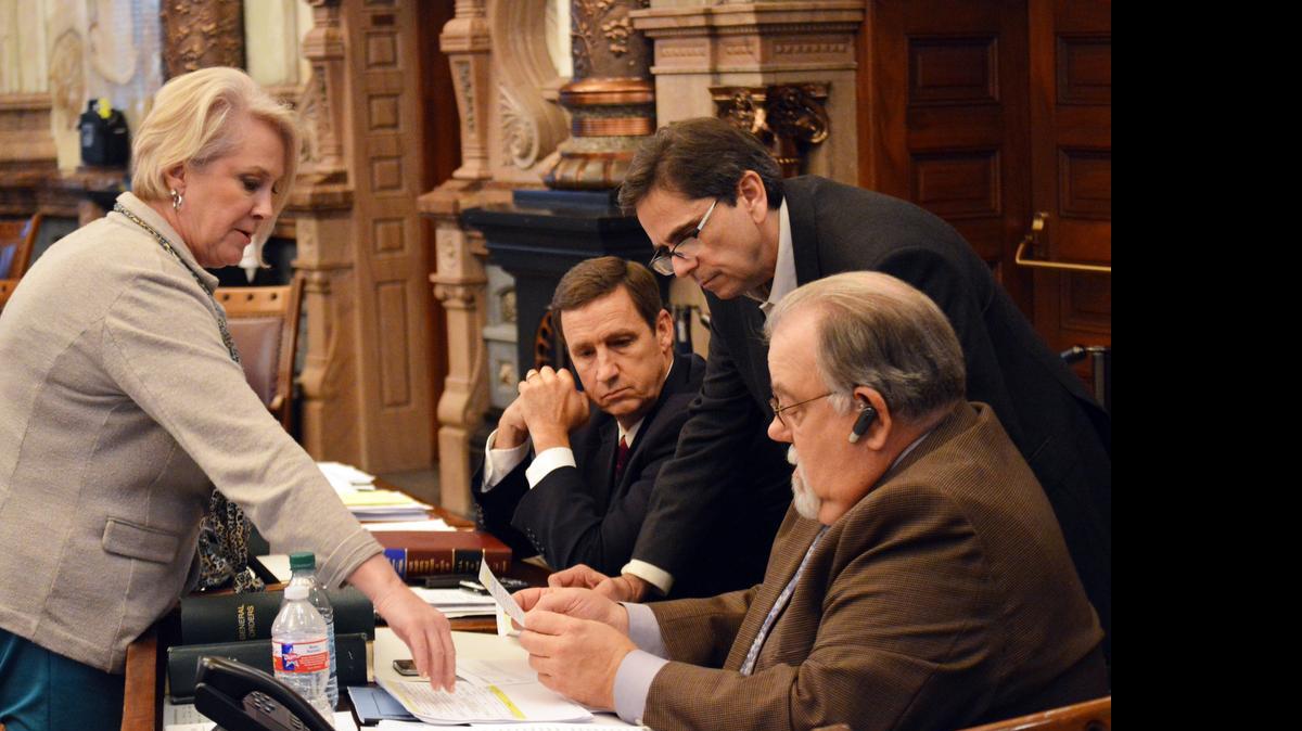 
Kansas state senators late Sunday discussed a plan to eliminate exemptions to the state's sales tax. They are, left to right, Julia Lynn of Olathe; Dennis Pyle of Hiawatha; Jeff Melcher of Leawood, and Steve Abrams of Arkansas City. All are Republicans.
