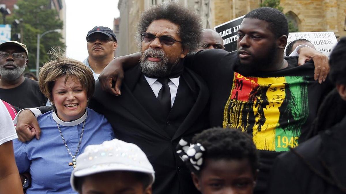 
Princeton professor and civil rights figure Cornel West, center, was one of a number of protesters arrested Monday at the Thomas F. Eagleton Federal Courthouse in St. Louis. 

