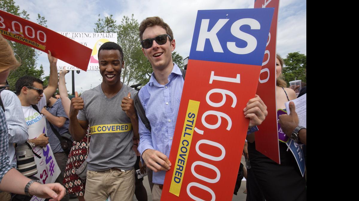 
Supporters celebrate the U.S. Supreme Court’s affirmation of the Affordable Care Act.
