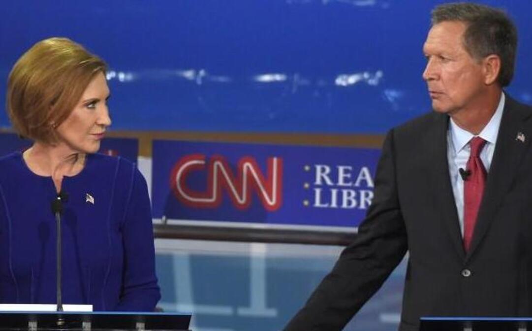 
Republican presidential candidate Carly Fiorina (left) had a strong showing at the main GOP debate Wednesday night, outshining Ohio Gov. John Kasich (right) and several others.
