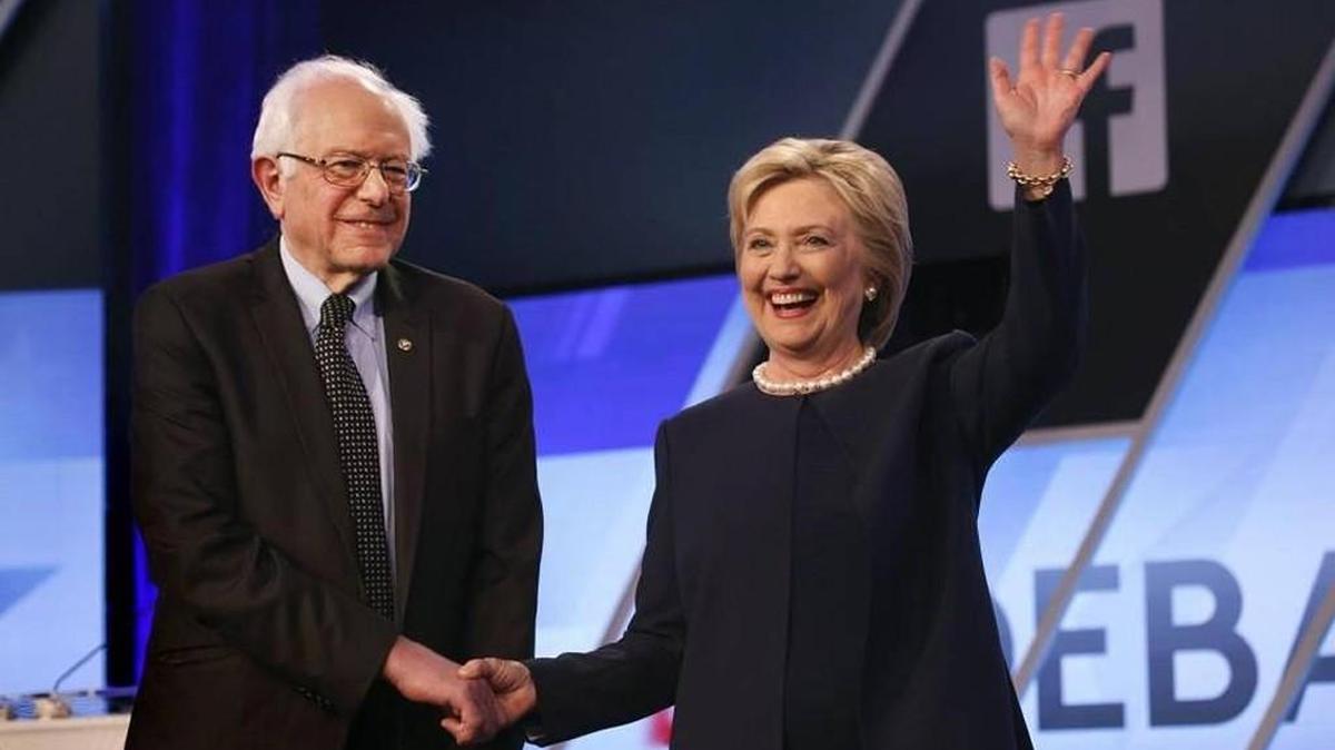Hillary Clinton and Bernie Sanders smiled as they shook hands during their March 9 debate in Miami.
