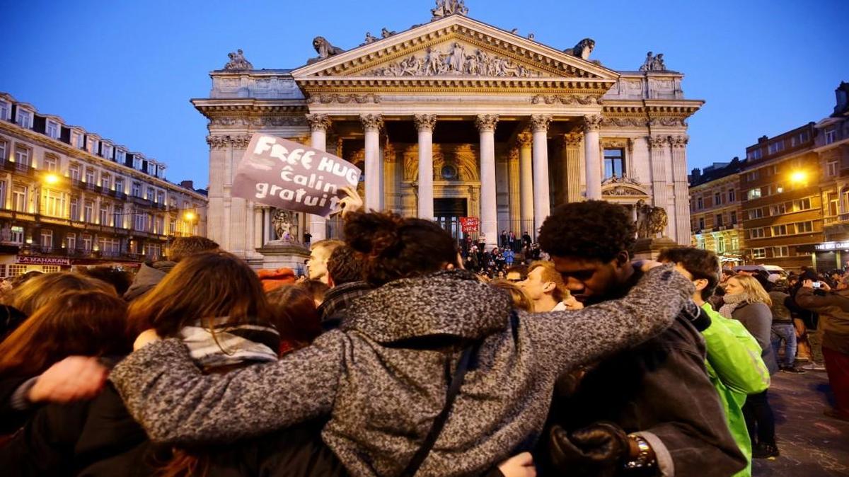 Members of the public gathered at the Place de la Bourse in Brussels to leave messages and tributes following the terrorist attacks on Tuesday.