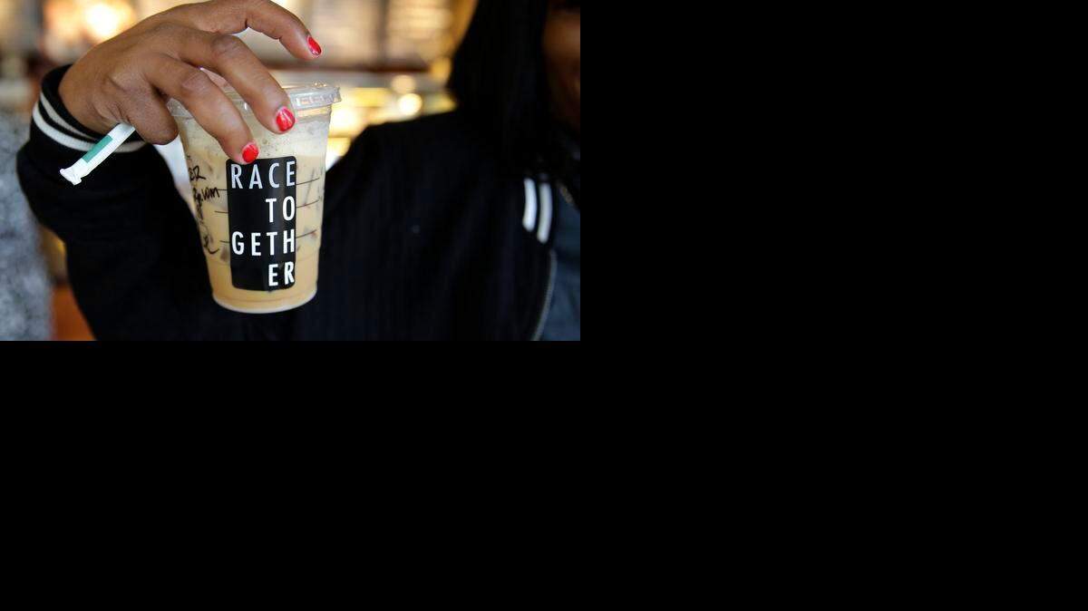 
An iced coffee at a Seattle Starbucks store bore a “Race Together” sticker after the company announced last week an awareness campaign on race relations.
